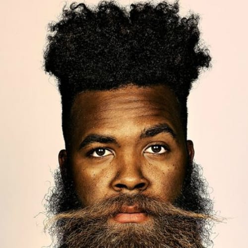 Lightly Faded Flat Top with blonde beard - black man