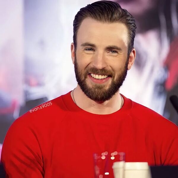 Brush Textured Shiny Captain America Haircut - Chris Evans wearing red plain shirt.