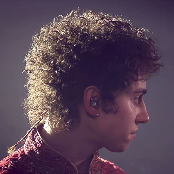 Curly Hair with Rat Tail - a man wearing ear piece and chinese collar Hanfu.