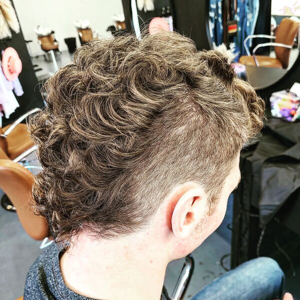 Light Cool Brown Curly Mullet - a man wearing shirt.