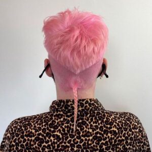 Pink Tinted V-Shape Rat Tail - a man wearing leopard inspired polo.