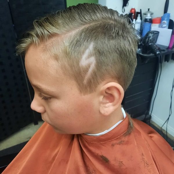 Simple Cut  - a boy wearing plain barber cape.