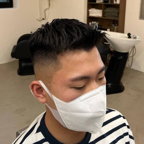 Asian Taper Fade Crew Cut - a man wearing white mask in black white stripe shirt.