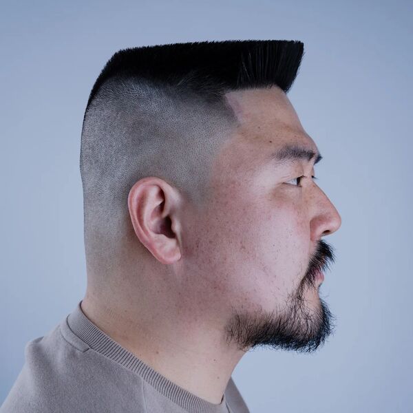 Flat Top Navy Haircuts for Men- a man in a side view wearing a t-shirt