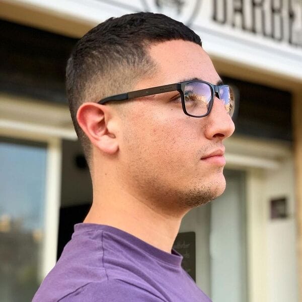 Textured Crew Cut Fade - a man wearing lavender shirt in glasses.