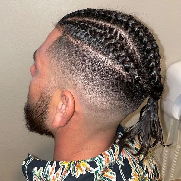 Long Dutch Braids Hairstyle with Skin Fade - wearing a polo