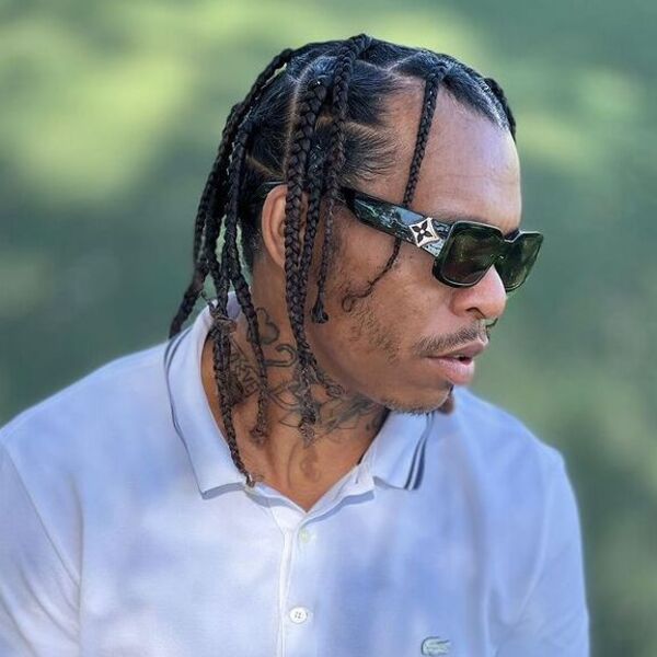 Long Frilly Box Braids Hairstyle - wearing a sunglasses and a white polo shirt