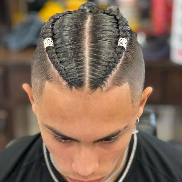 Man Bun Corn Rows Fade Cut with Beads - wearing a silver necklace