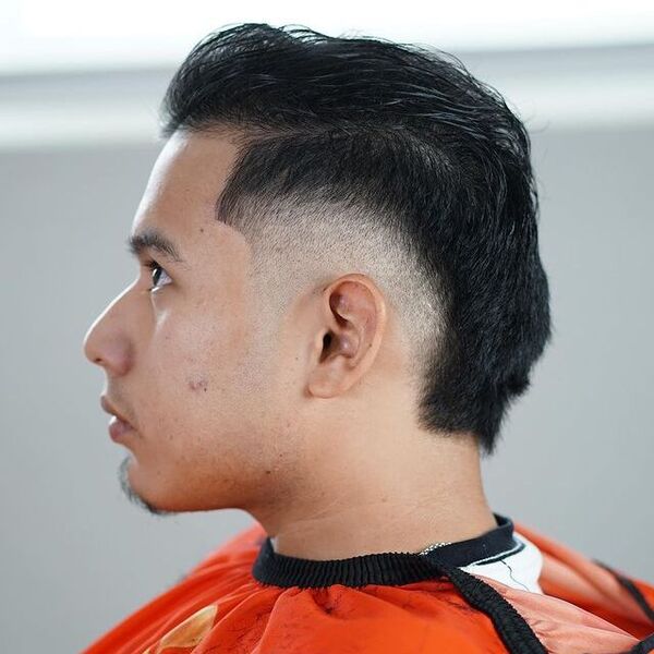 Mohawk Undercut Hairstyle - wearing an orange cover