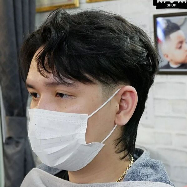 Shaggy Undercut with Low Fade Hair - wearing a white mask