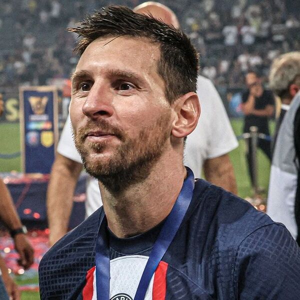 Faux Taper Fade Haircut - wearing a blue jersey lionel messi haircut