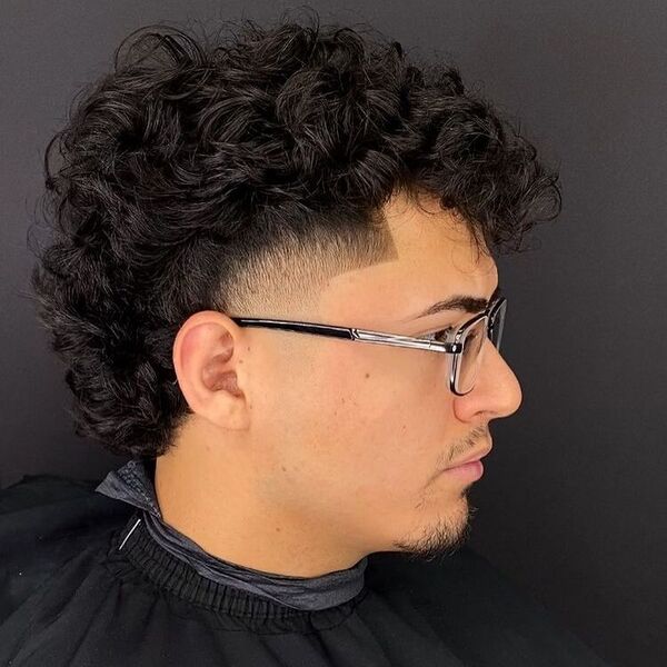 Drop Fade - a man wearing an eyeglasses and a black cover