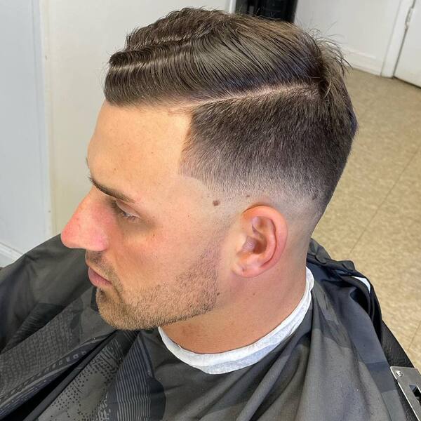 mid fade - a man wearing a black cover