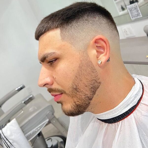 mid fade - a man wearing a white cover