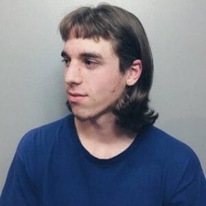 wearing a blue T-shirt