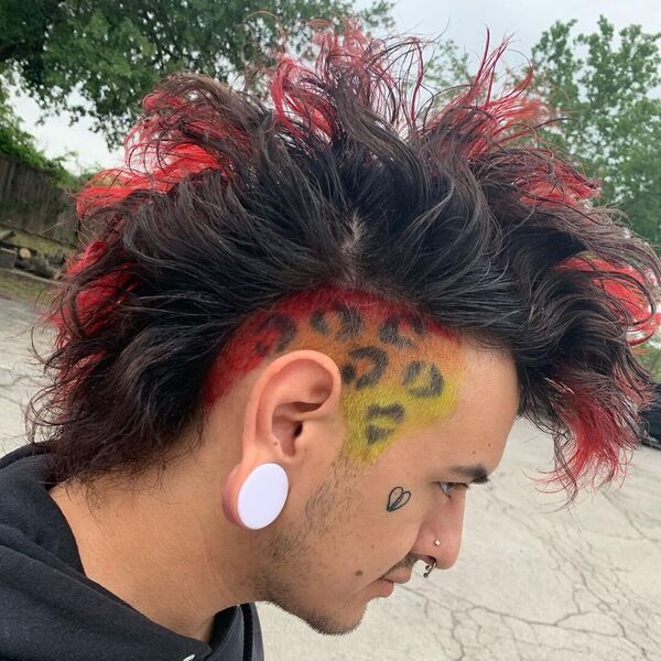 with heart tattoo on his face