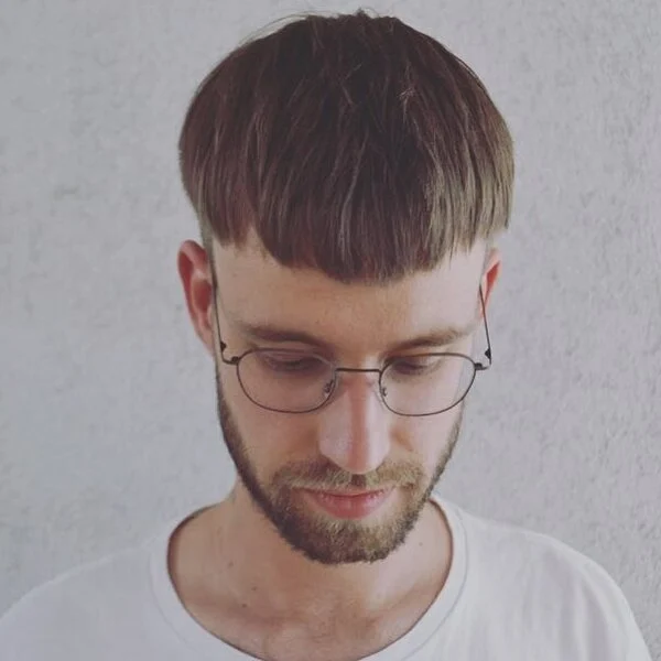 Bowl Haircut with Trimmed Front Fringe with Fade - wearing eyeglass