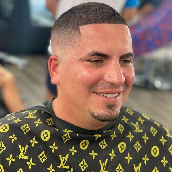 Bowl Hairstyle with Clean Short Hair - wearing haircut cover with design