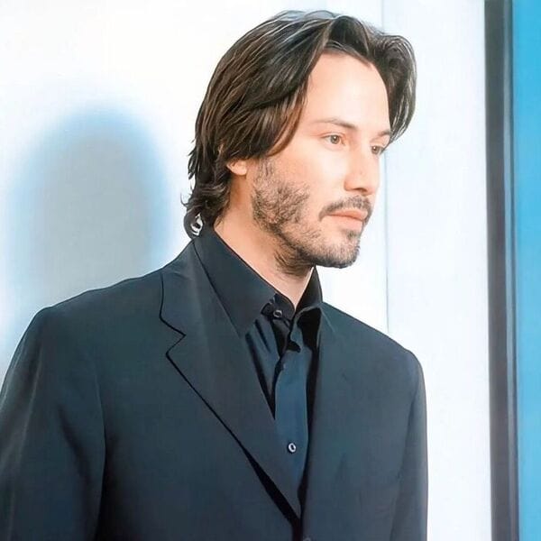 Curtain Hair Keanu Style - Face-framing cut Keanu Reeves curtain hairstyle for men - wavy textured ends 2025