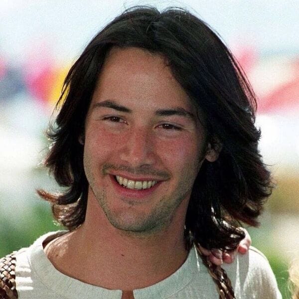 Long Layered Keanu Style - Matrix-inspired look Keanu Reeves long layered hairstyle for men - wavy styling 2025