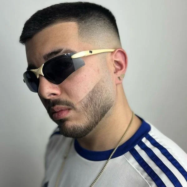 Short Haircut with Clean Mid Fade Cut - wearing sunglasses and long gold necklace