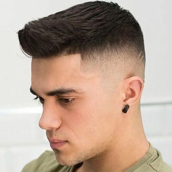 Upper Pomp Taper with Skin Fade with Tiny Slit Cut - wearing black earring