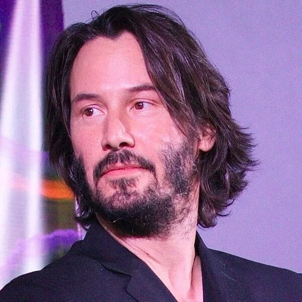 Keanu Reeves Hairstyle Wadded Hair with Curly Ends Hairstyle - wearing black tuxedo