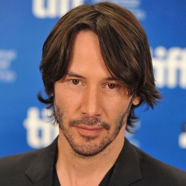 Wavy Fringe Keanu Style - Natural texture look Keanu Reeves wavy fringe hairstyle for men - textured front styling 2025