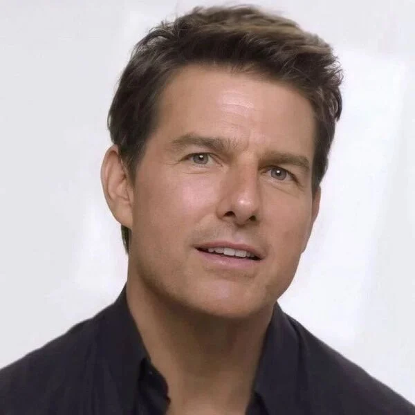 50 Trendy Tom Cruise Hairstyle Ideas for Men in 2022 - wearing a black polo