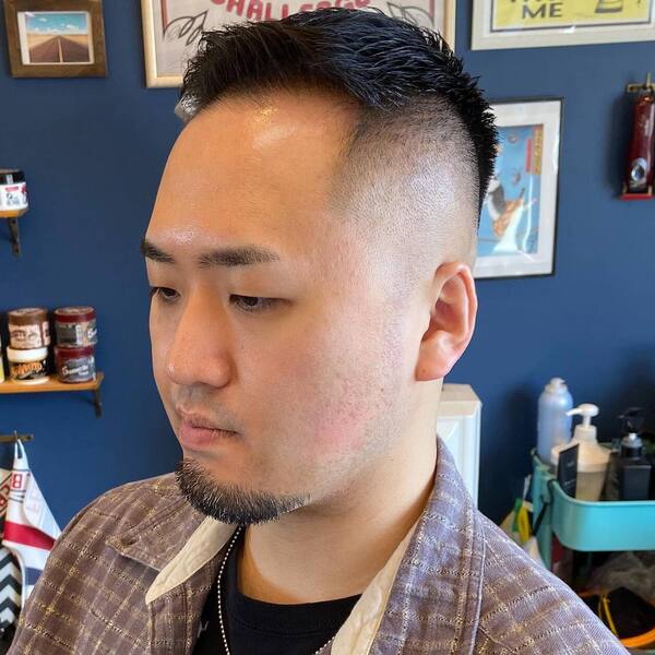 Taper Hair with Pomp Style Mid Fade Haircut - wearing black inner shirt