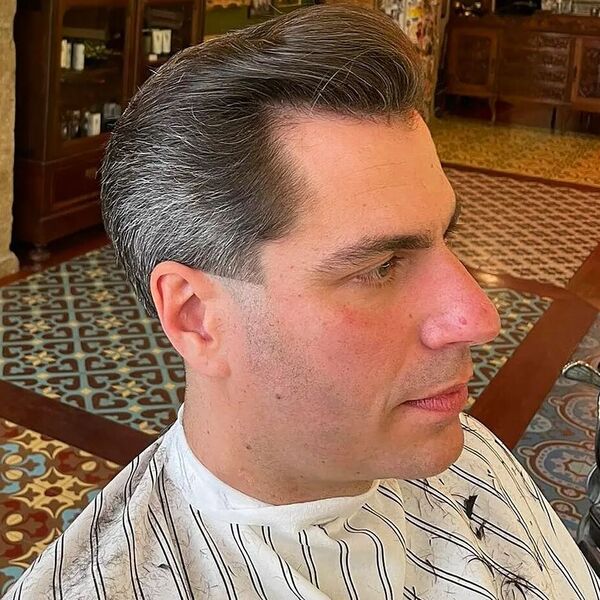 A man in a barbershop